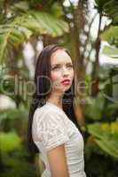 Pretty brunette hippie looking up