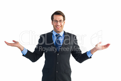 Businessman with open hands looking at the camera