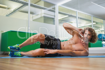 Portrait of a shirtless man doing fitness exercise