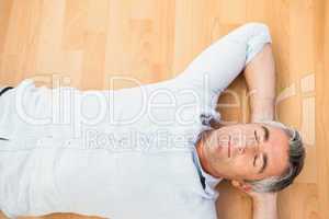 Man lying and relaxing on the floor