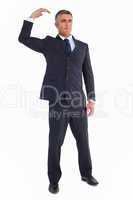 Cheerful businessman posing with arm up