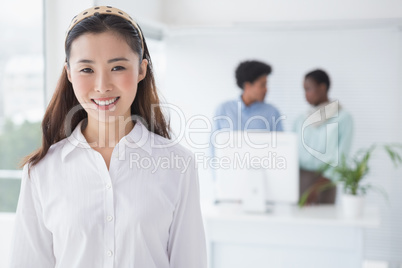 Casual businesswoman smiling at camera