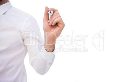 Mid section of businessman writing with marker