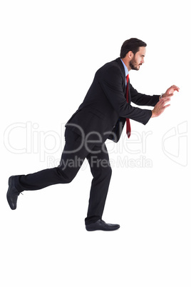 Businessman in suit pushing with hands