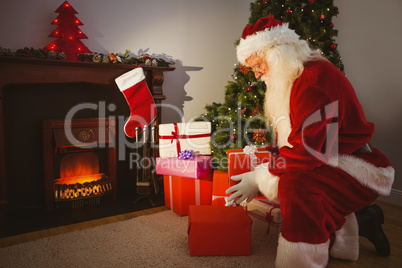 Santa claus delivering gifts at christmas eve