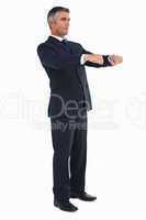 Businessman posing with open arms