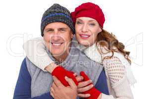 Happy couple in warm clothing