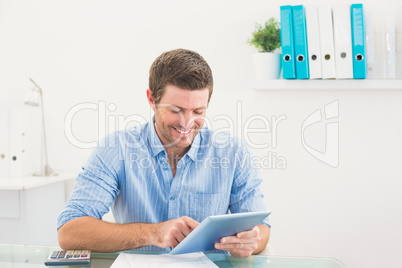 Casual businessman using tablet Casual businessman using tablet