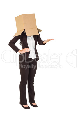 Businesswoman presenting with box over head