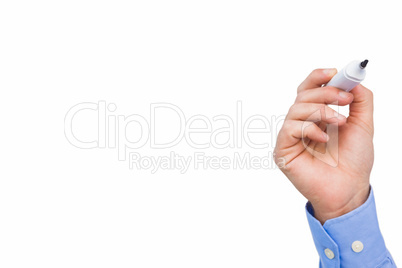 Hand of a businessman in shirt writing with marker