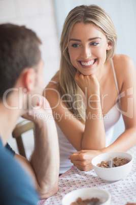 Cute couple having breakfast together