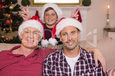 Son joking to his father and grandfather