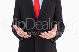 Businessman presenting with his hands