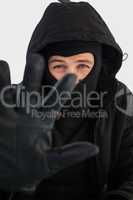 Portrait of burglar wearing a balaclava