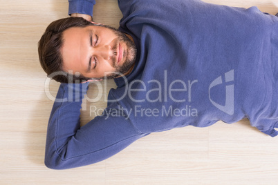 Sleeping man lying on floor