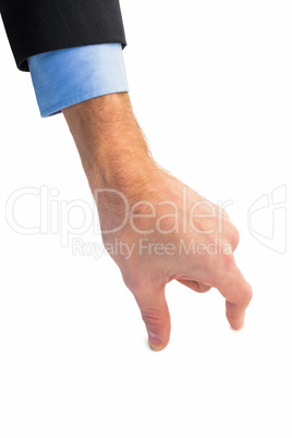 Businessman measuring something with these fingers