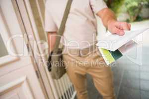 Postman delivering a letter