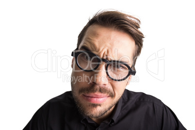 Portrait of a doubtful businessman with glasses