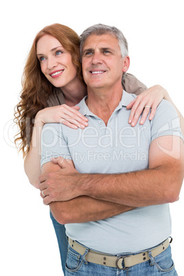 Casual couple hugging and smiling