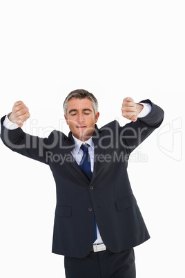 Elegant businessman with his arms out