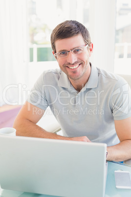 Casual businessman at desk