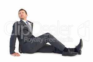 Businessman sitting and looking up