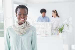 Casual businesswoman smiling at camera