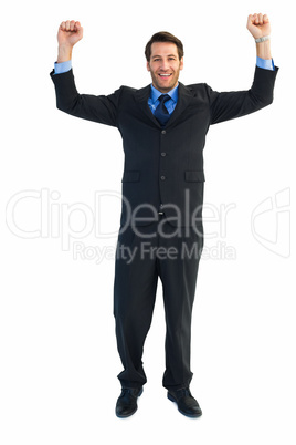 Portrait of a cheerful businessman with clenched fists