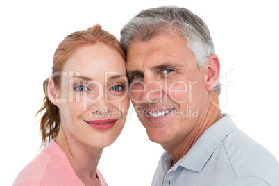 Casual couple smiling at camera