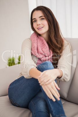 Pretty brunette smiling at camera