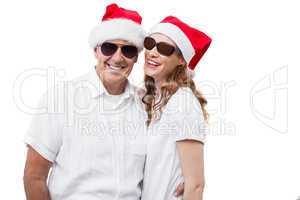 Festive couple smiling at camera