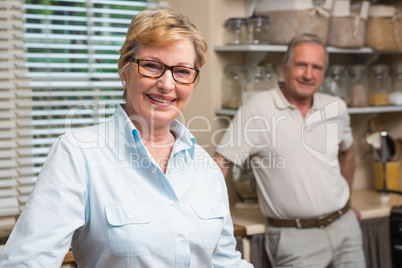 Senior couple smiling at the camera together