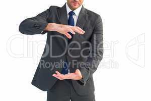 Businessman gesturing with his hands