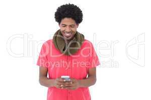 Smiling man with scarf text messaging