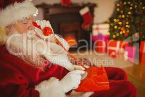 Santa claus making a phone call