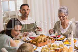 Smiling multi generation during christmas dinner