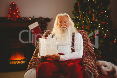 Santa claus showing his book