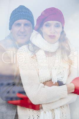 Happy couple in warm clothing