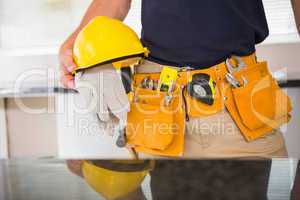 Close up of man with tool belt