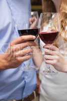 Close up of lovely couple enjoying red wine