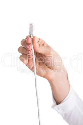 Hand of a businessman presenting white cable