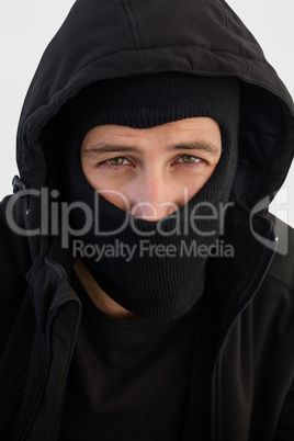 Portrait of burglar wearing a balaclava