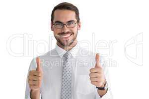Positive businessman posing with thumbs up