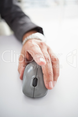 Businessmans hand on computer mouse
