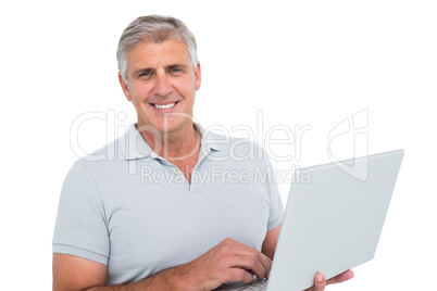 Casual man using a laptop