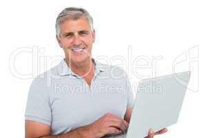 Casual man using a laptop