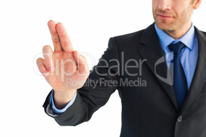 Businessman pointing these fingers at camera