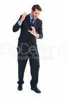 Businessman carrying something with his hands