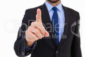 Businessman pointing his finger at camera