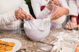 Multi-generation family baking together